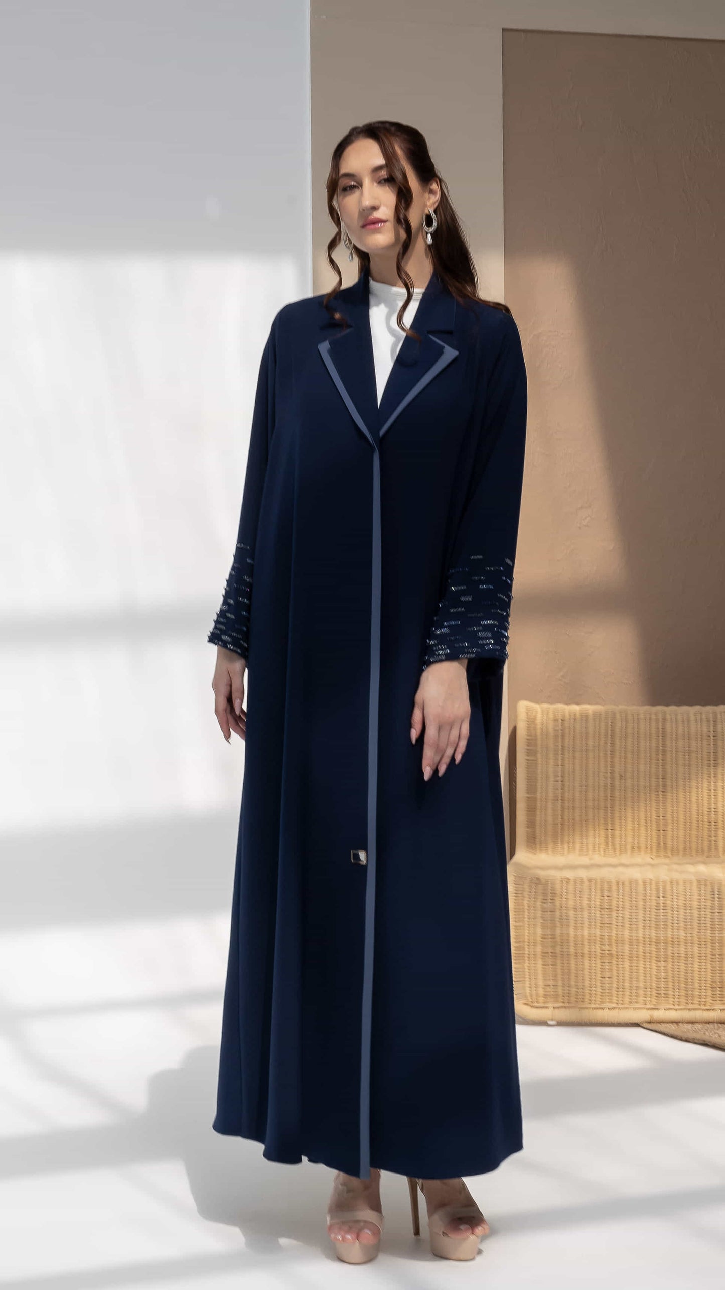 RANYA | Midnight Crystal Rain Full length midnight nacy abaya with lapel collar and flowing silhouette studio setting