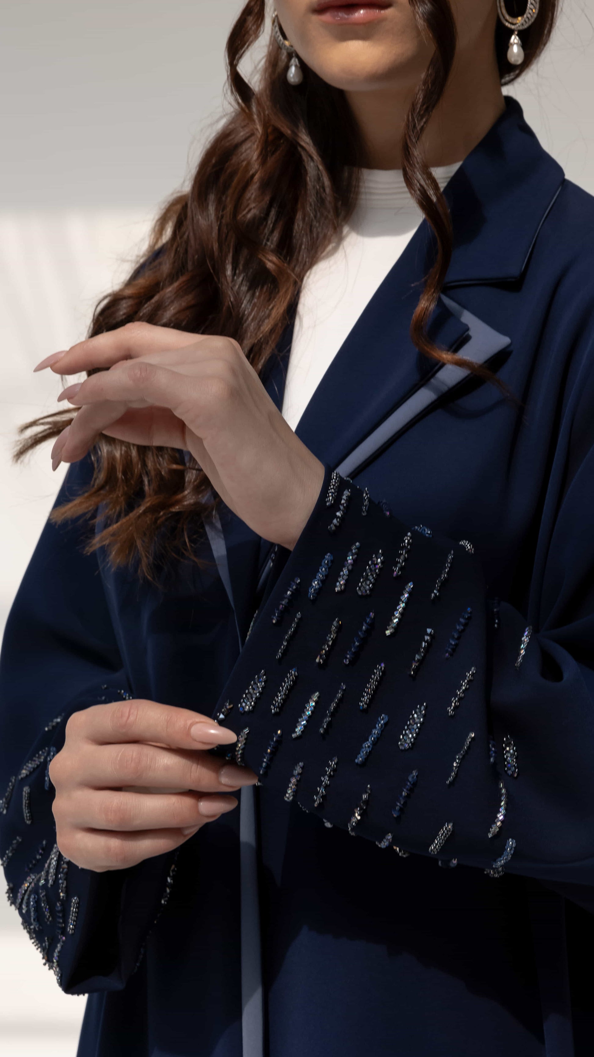 RANYA | Midnight Crystal Rain Close-up shot of lapel collar and crystal embellishments on navy abaya sleeve