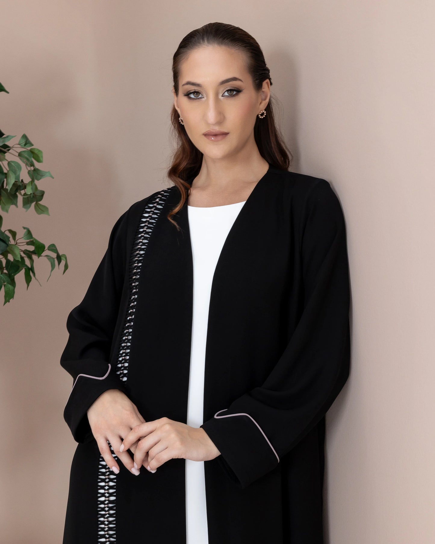 RASMAH Eclipse Noir abaya Stylish pose showcasing the artistry
