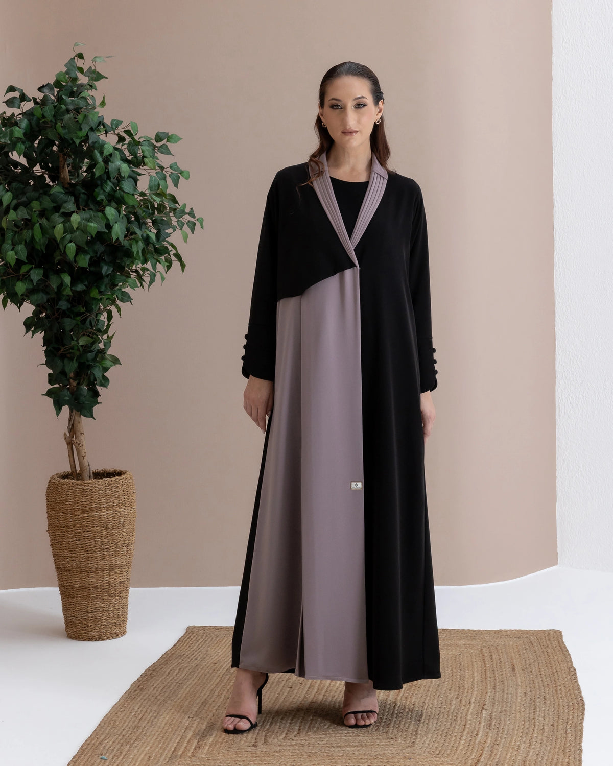 RAWAN Taupe Noir elegant two-tone abaya featuring fluid draping and minimalist couture styling