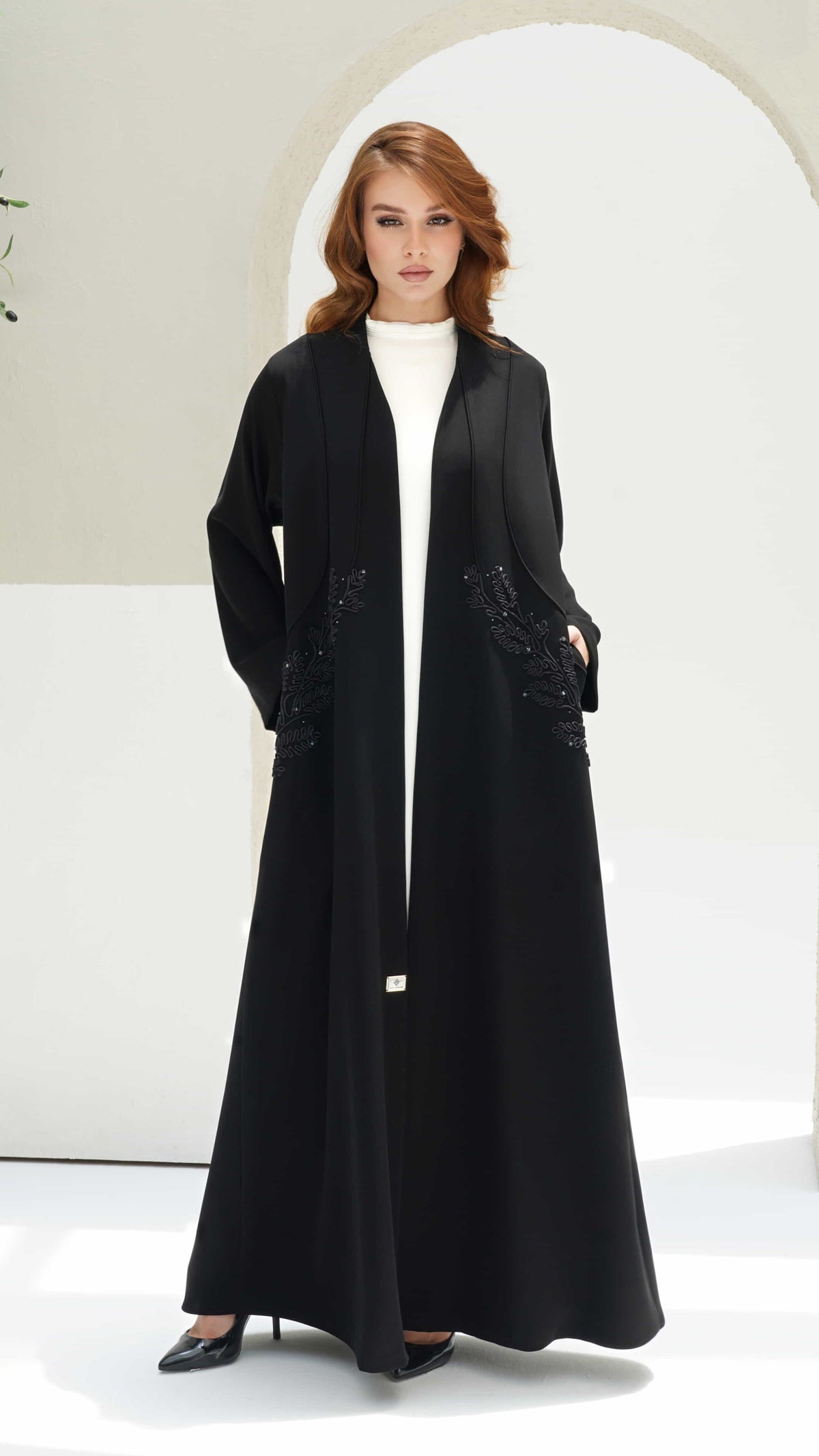 RAYHANA | Noir Botanique Black luxury abaya with botanical embroidery and subtle crystal detailing by Diva Atelier Dubai