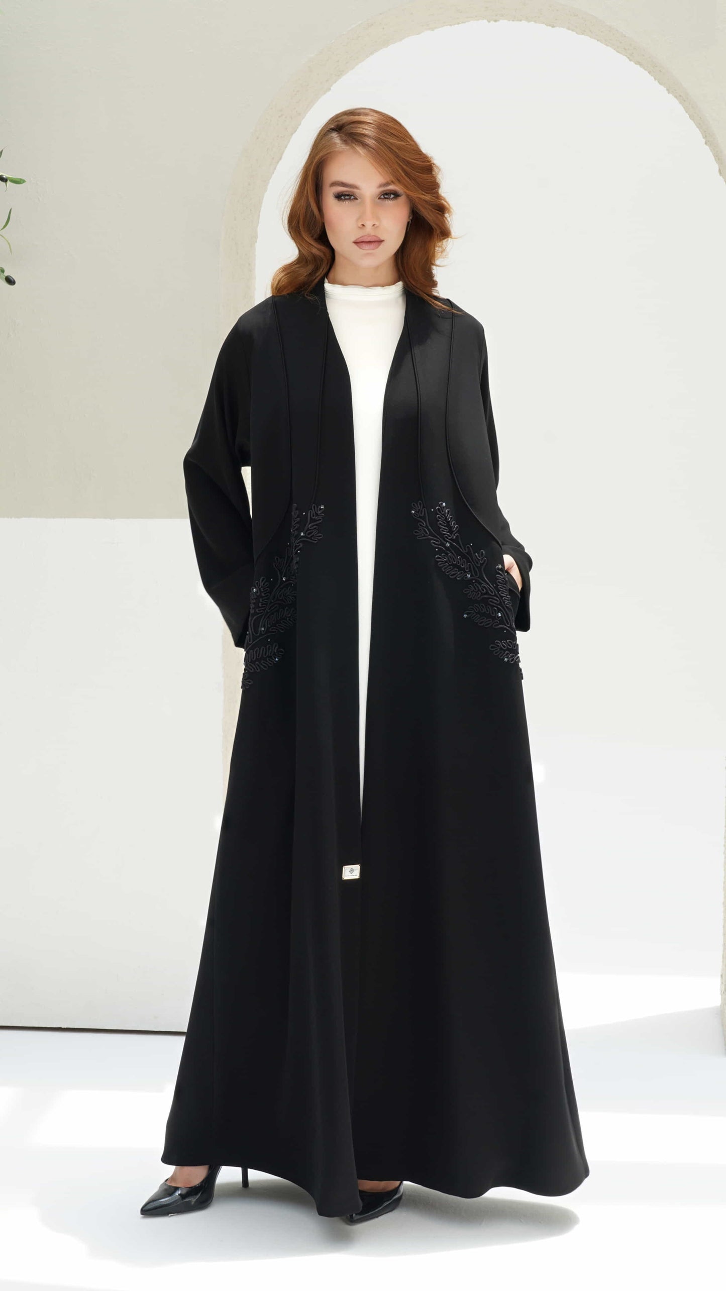 RAYHANA | Noir Botanique Black luxury abaya with botanical embroidery and subtle crystal detailing by Diva Atelier Dubai