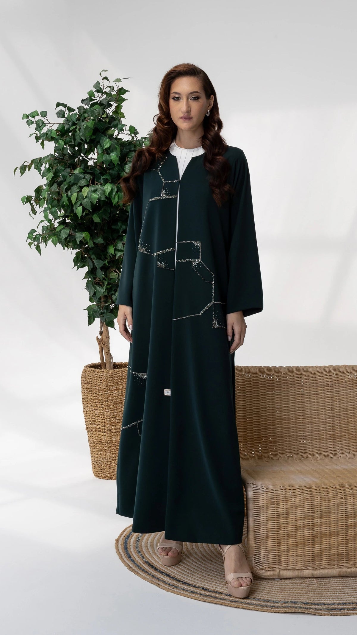 RUBA Emerald Mirage luxury modest abaya featuring geometric crystal embellishments full-length portrait