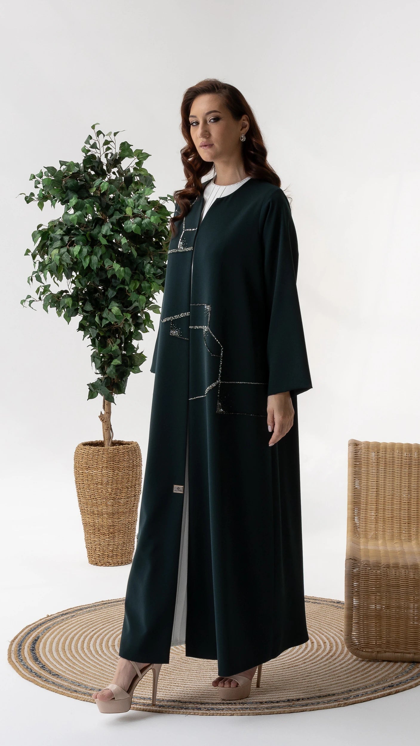 RUBA Emerald Mirage luxury modest abaya featuring geometric crystal embellishments full-length portrait