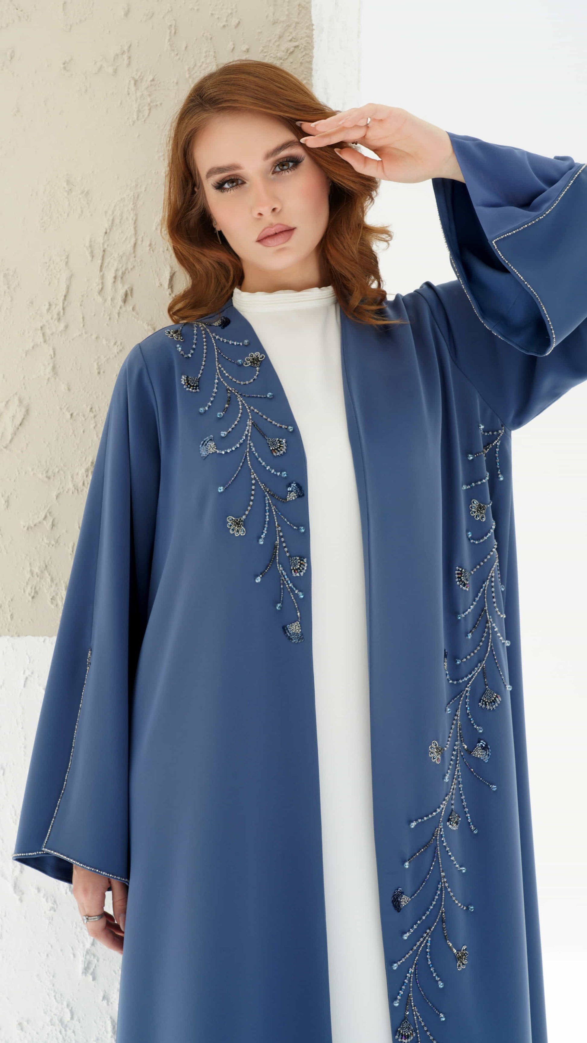 SORINA | Twilight Sapphire Close up of sapphire abaya showing intricate beadwork and floral motifs