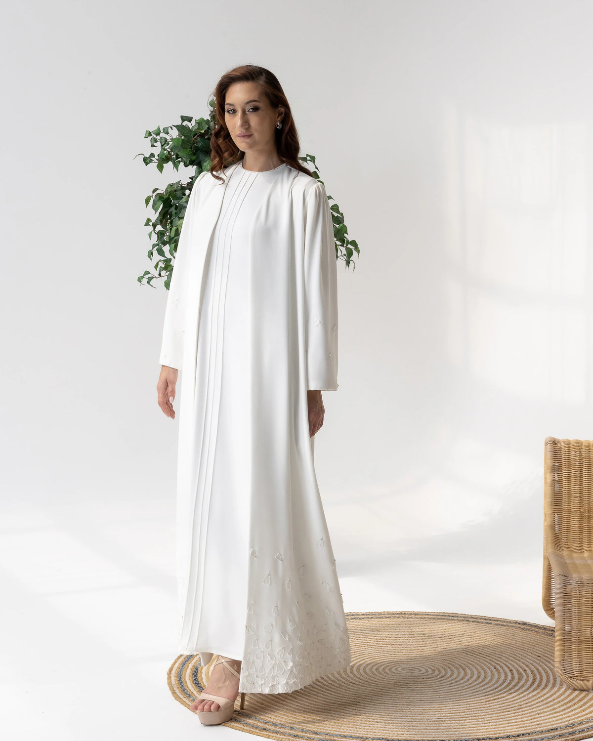 THALJIYYAH Snow-Blossom elegant ivory abaya showcasing intricate floral couture craftsmanship