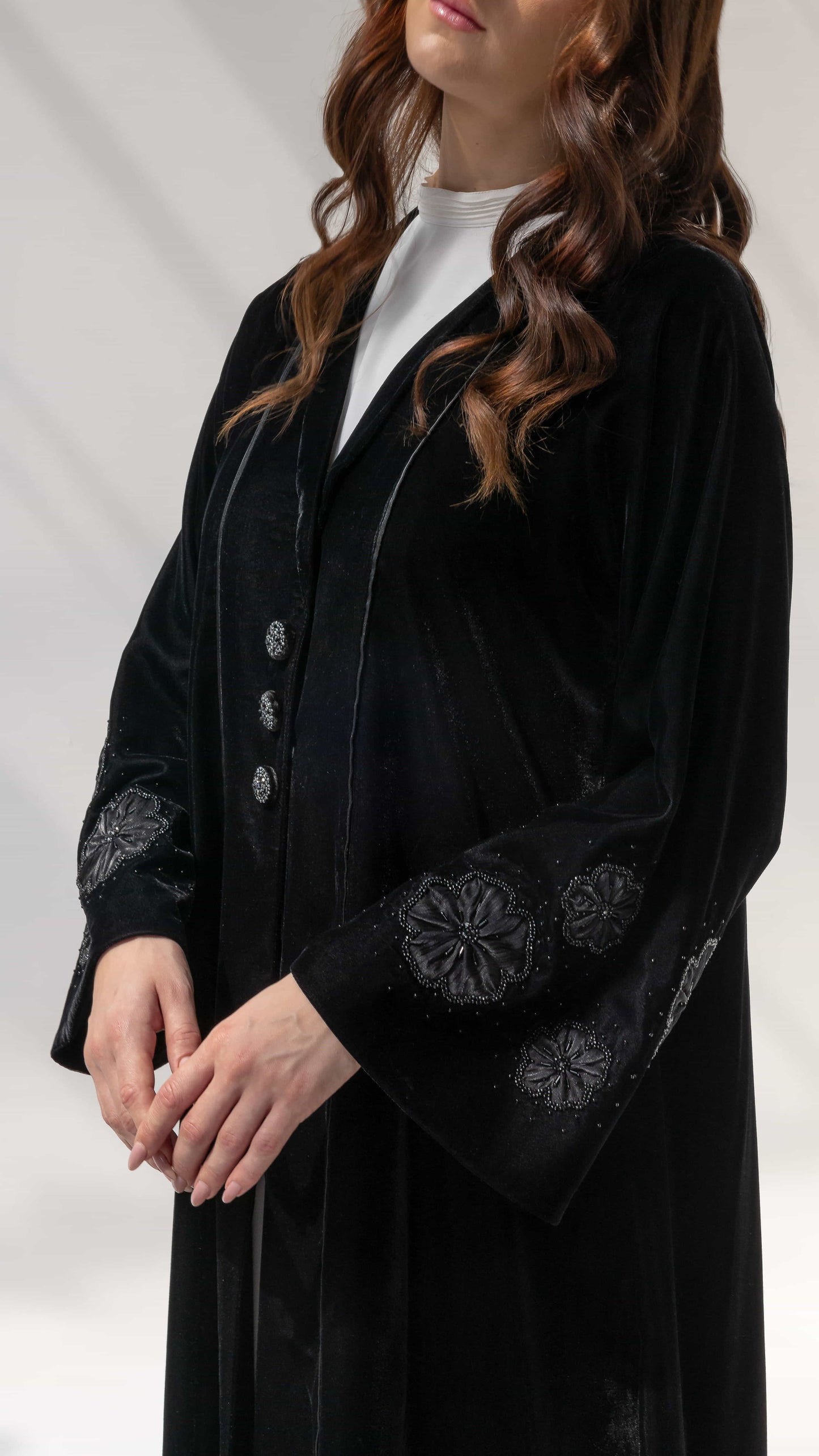 Warda Noir Floral Velvet Abaya by Diva Atelier - Side angle black velvet abaya showing floral beadwork sleeve design detail