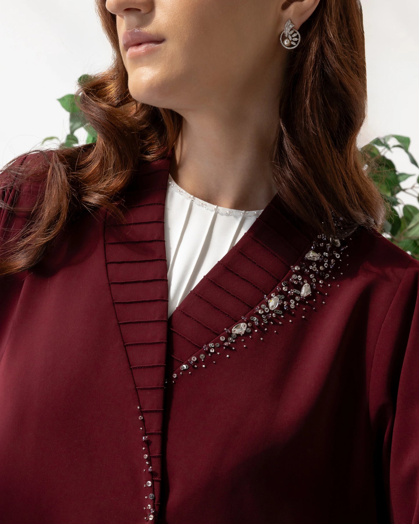 YUMNA Royal Burgundy Elegance close-up of pleated collar and hand-embellished crystal beadwork