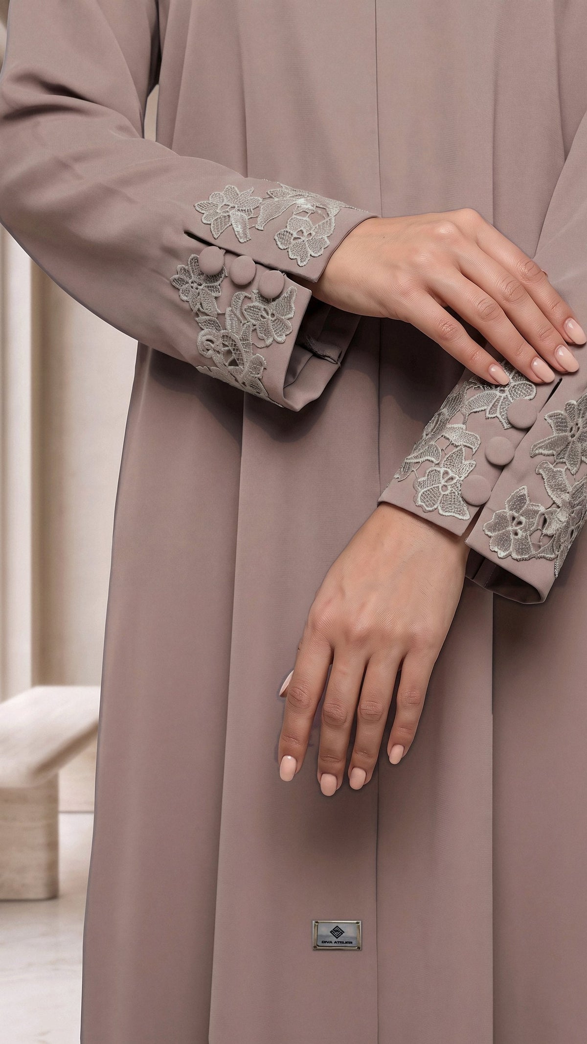 RAHAF lace cuffs, hands crossed
