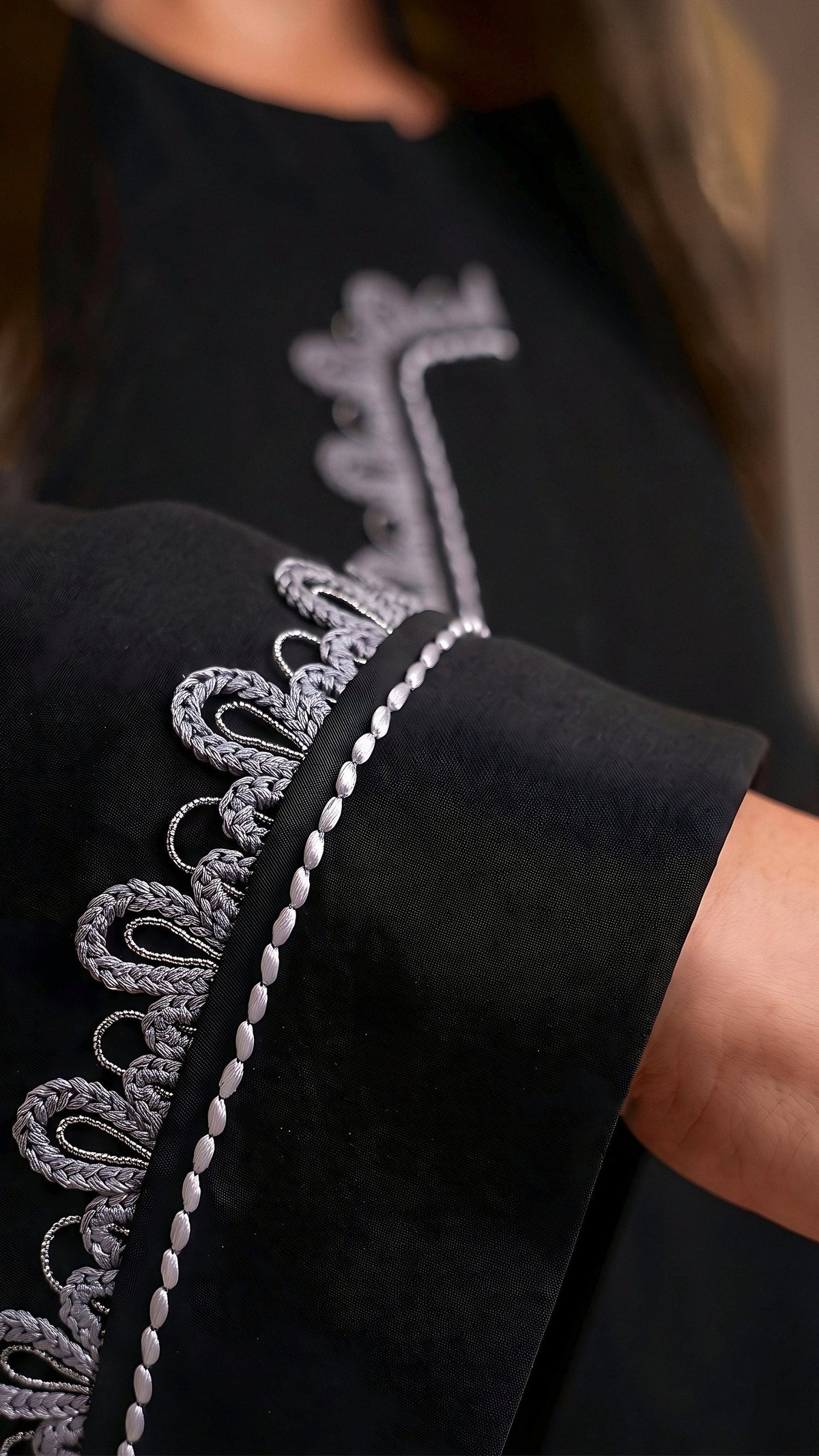 RETAJ embroidered cuff macro detail
