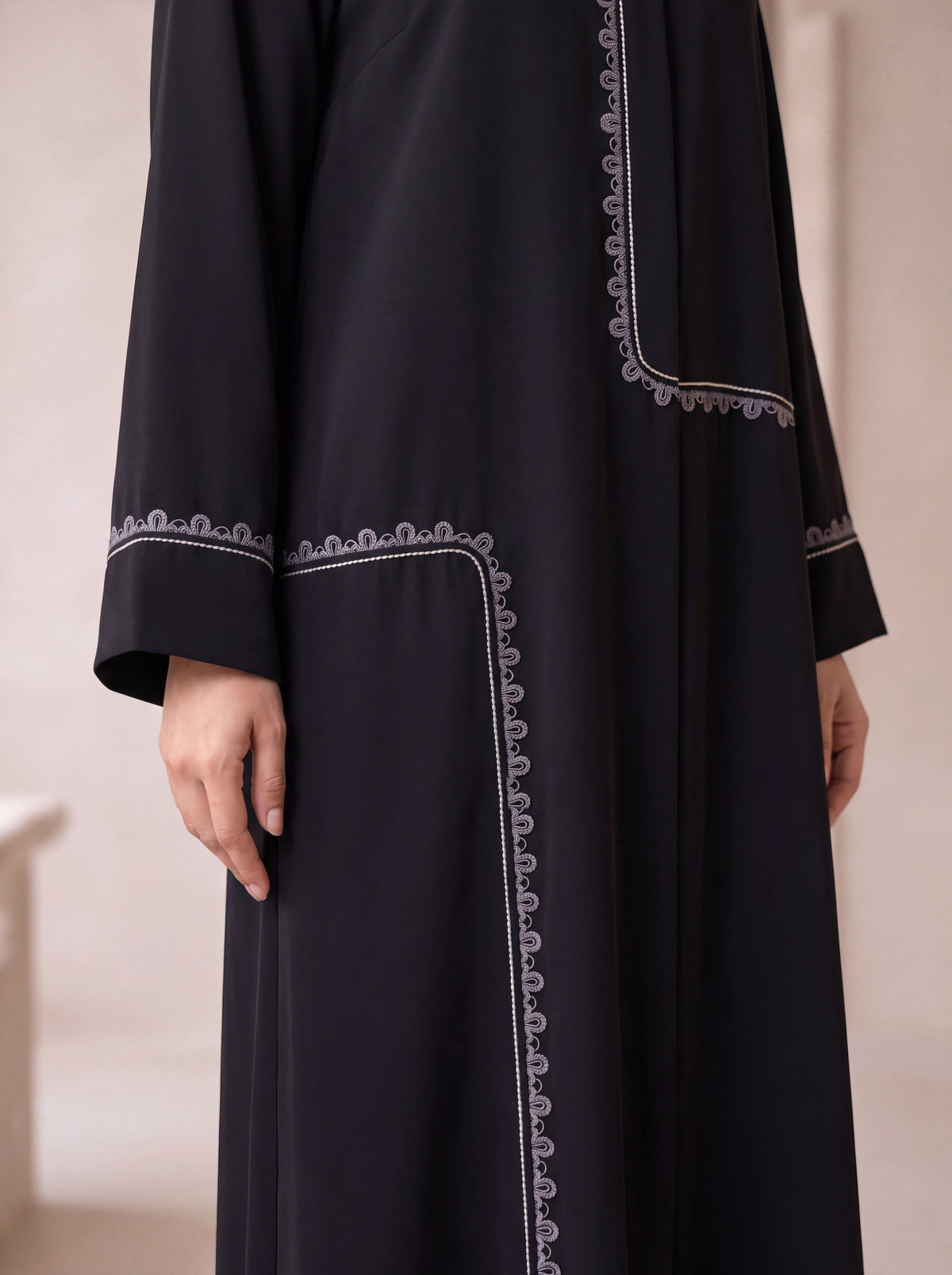 RETAJ embroidered trim close-up, other side