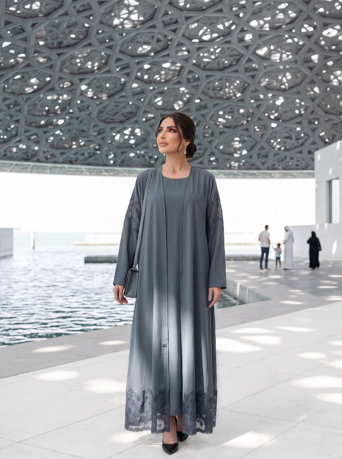 SADEEM abaya visiting a museum dome