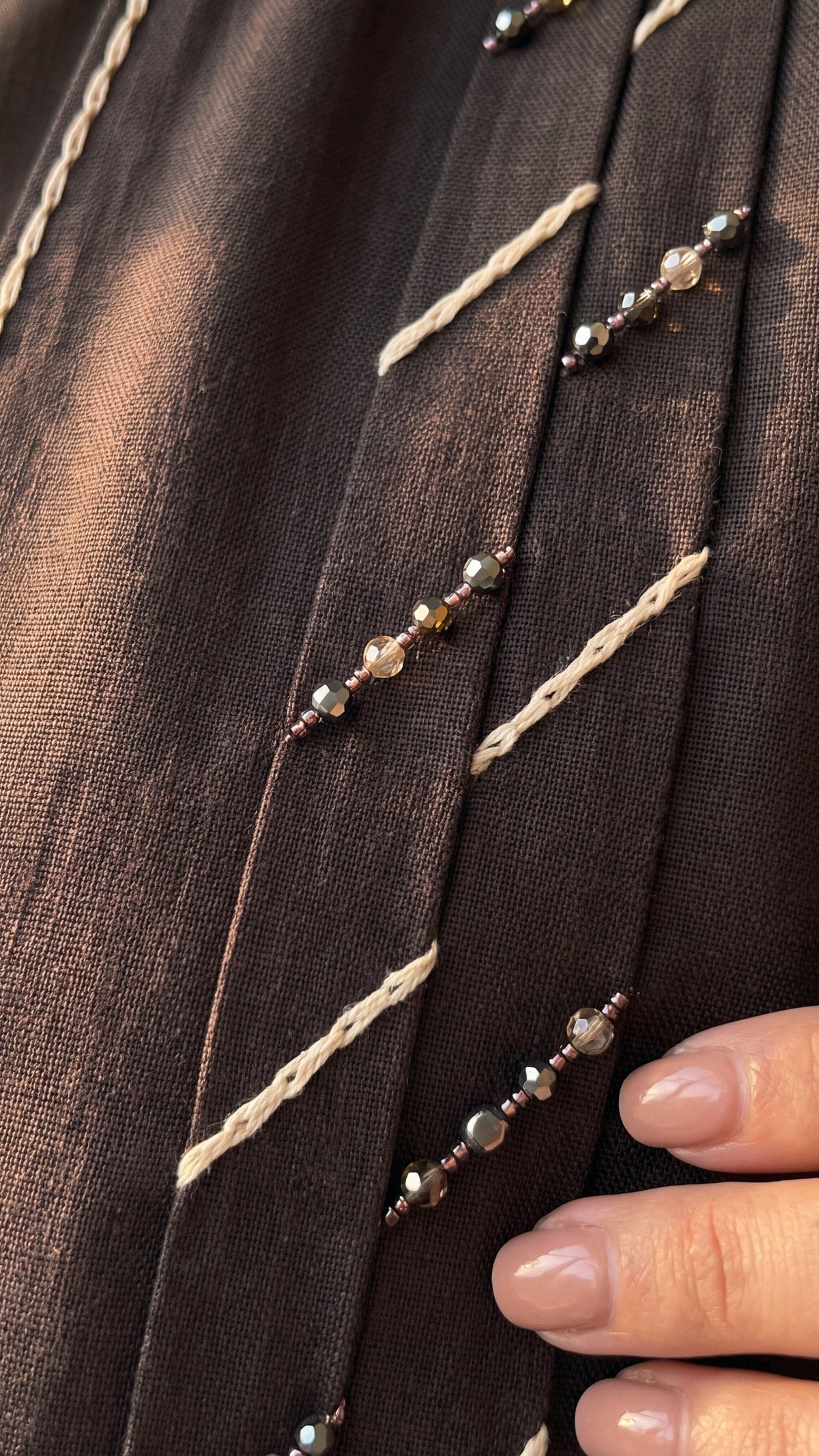 SIDRA hand-beaded band macro detail