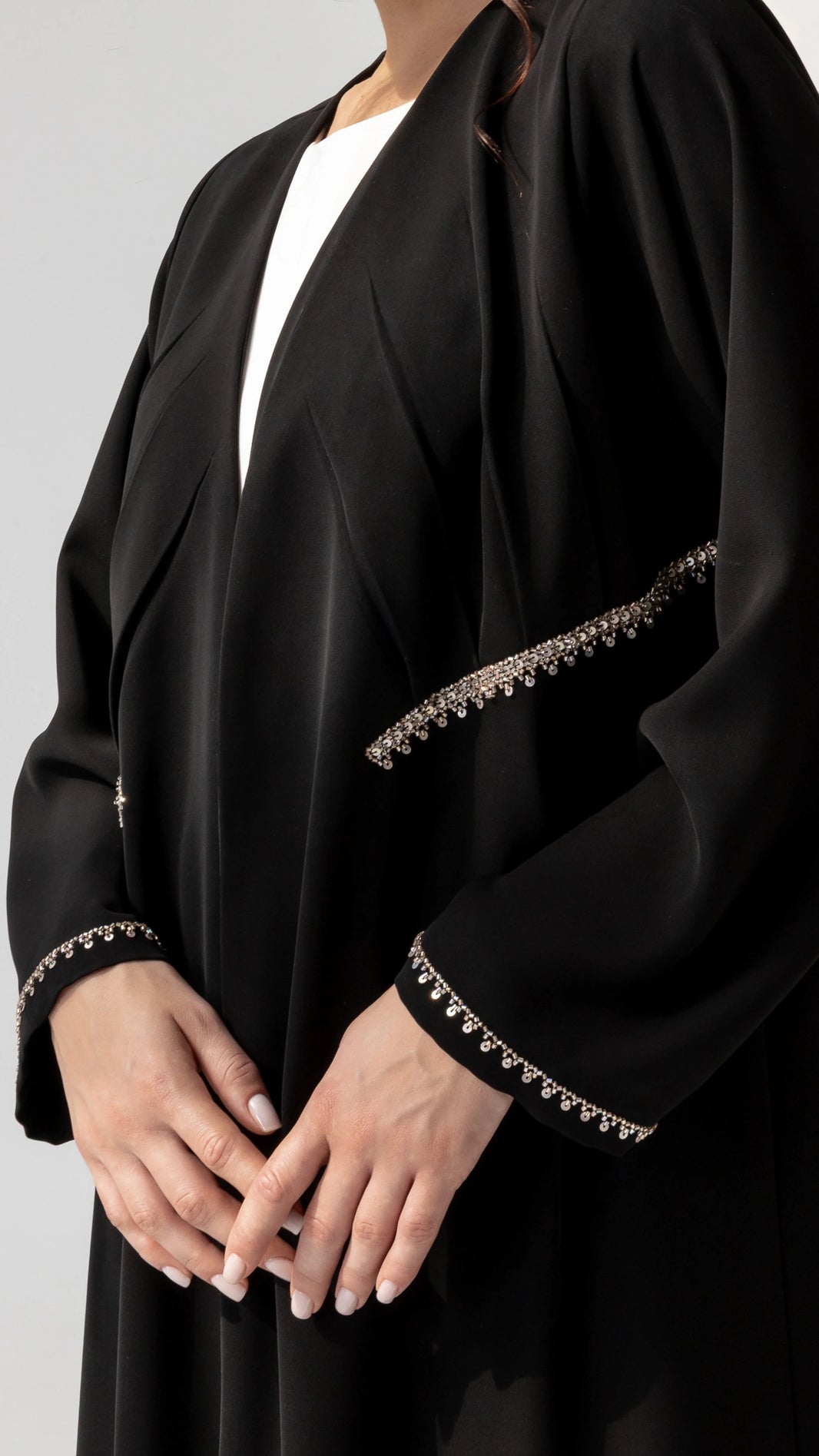 DOUNIA Noir Lumière luxury black abaya video with nude-gold crystal trim detailing by Diva Atelier