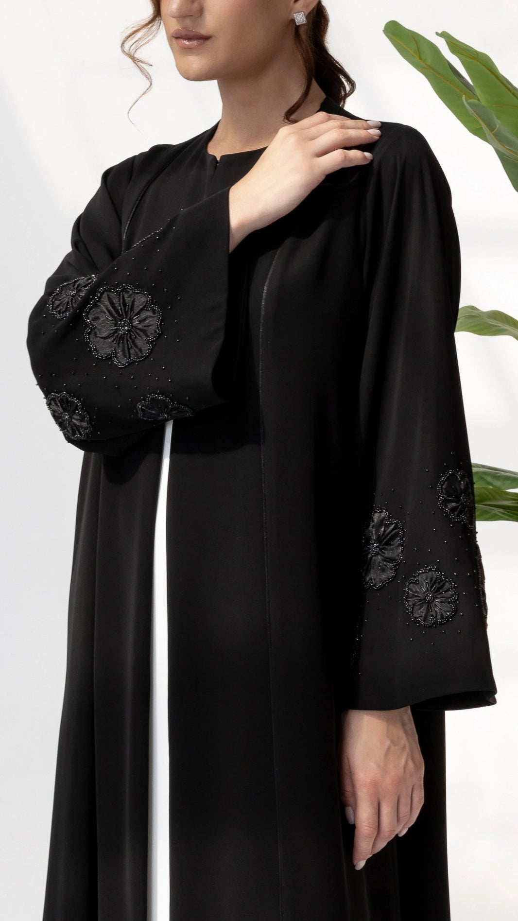 NAFISA | Noir Blossom Luxe, a luxury black abaya by Diva Atelier