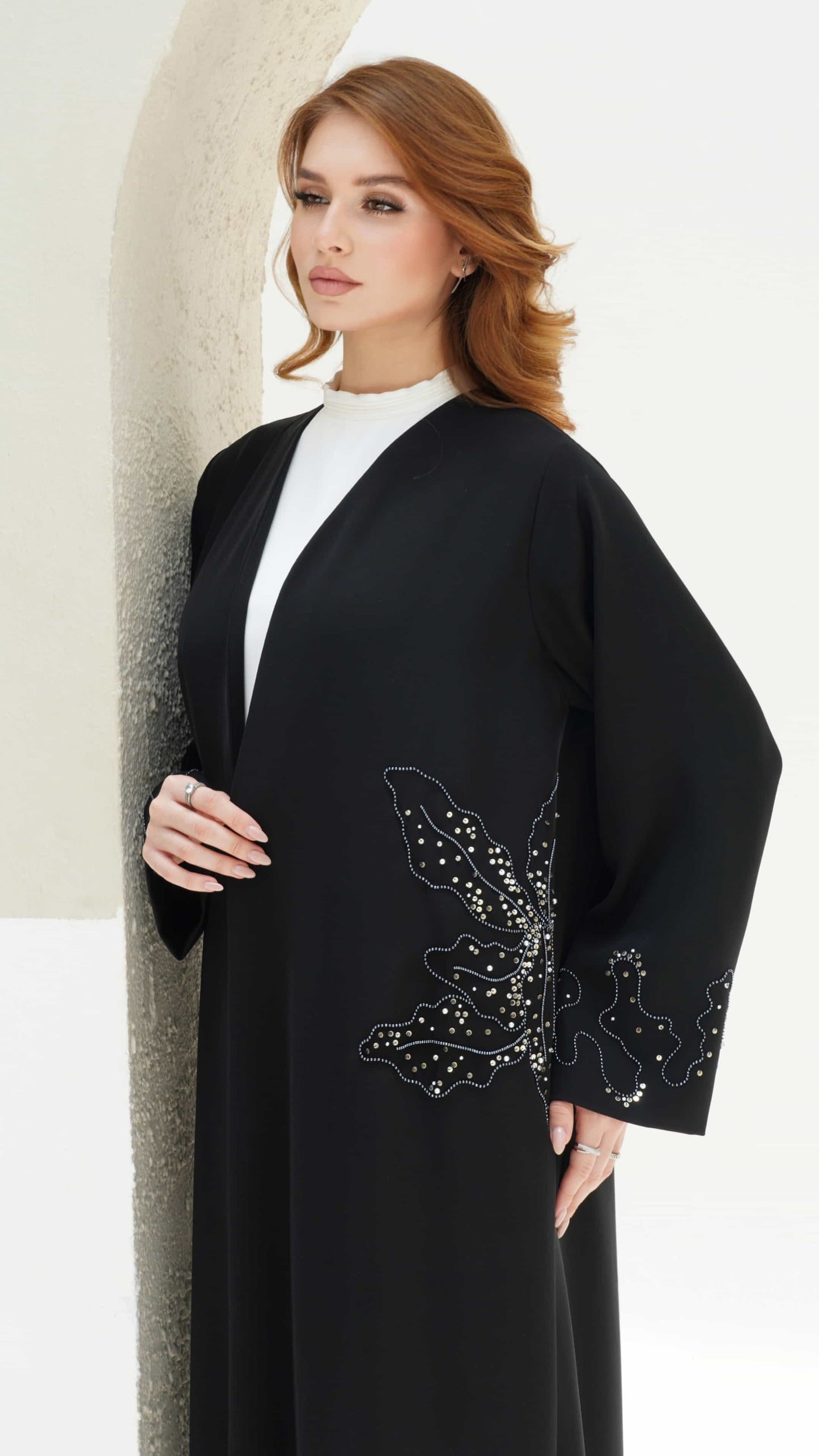 AZIZA | Noir Fleur Video - black abaya with elegant floral embellishments and fluid silhouette